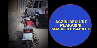 Ağzını değil’de plakasını maske işle kapattı