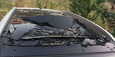 Bursa'da apartmandan atılan kemikler park halindeki otomobilin tavanında hasar oluşturdu