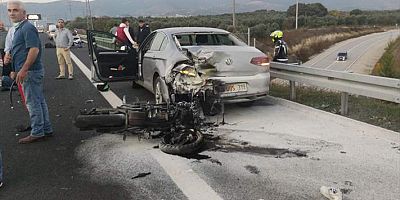 Bursa'da otoyol kenarındaki otomobile çarpan motosikletteki 2 kişi yaralandı