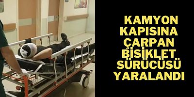 Kamyon kapısına çarpan bisiklet sürücüsü yaralandı