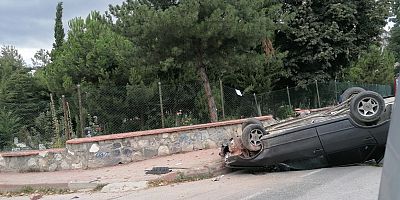 Kontrolden çıkan otomobil duvara çarpıp takla attı