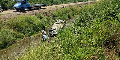 Kontrolden çıkan otomobil takla atarak dereye uçtu