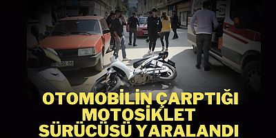 Otomobilin çarptığı motosiklet sürücüsü yaralandı