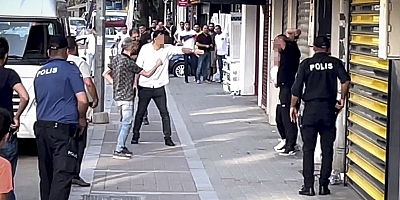 Polise teslim olmamak için yanındaki kadını tabancayla rehin aldı