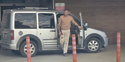 Römork kapağına kolunu sıkıştıran genç yaralandı