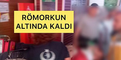 RÖMORKUN ALTINDA KALDI