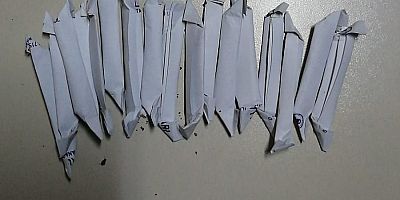 SUÇÜSTÜ YAKALANDI