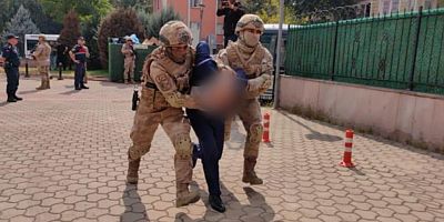 TUTUKLANAN ŞAHIS KENDİNİ ASTI