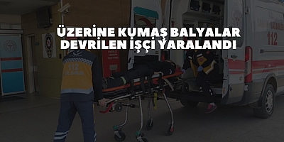 Üzerine kumaş balyalar devrilen işçi yaralandı